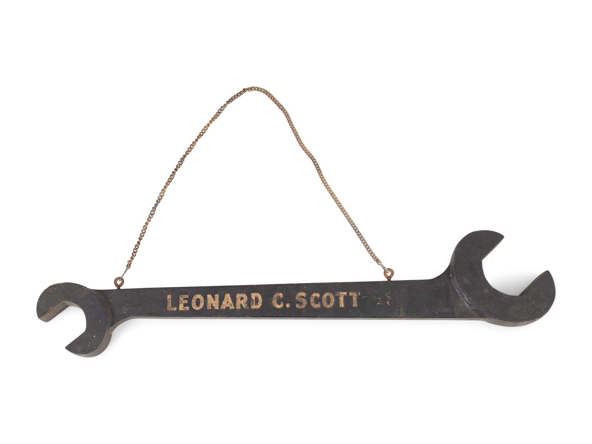 A Wrench-From Trade Sign and a Harness Maker Trade Sign