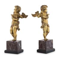 A Pair of Continental Gilt Bronze Figures of Putti