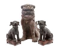 A Group of Three Chinese Foo Dogs Height of tallest 12 inches.