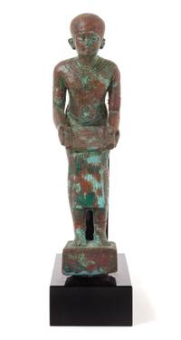 An Egyptian Bronze Seated Imhotep Height 5 1/2 inches. — LATE PERIOD TO PTOLEMAIC PERIOD, 664-30 B.C.E.