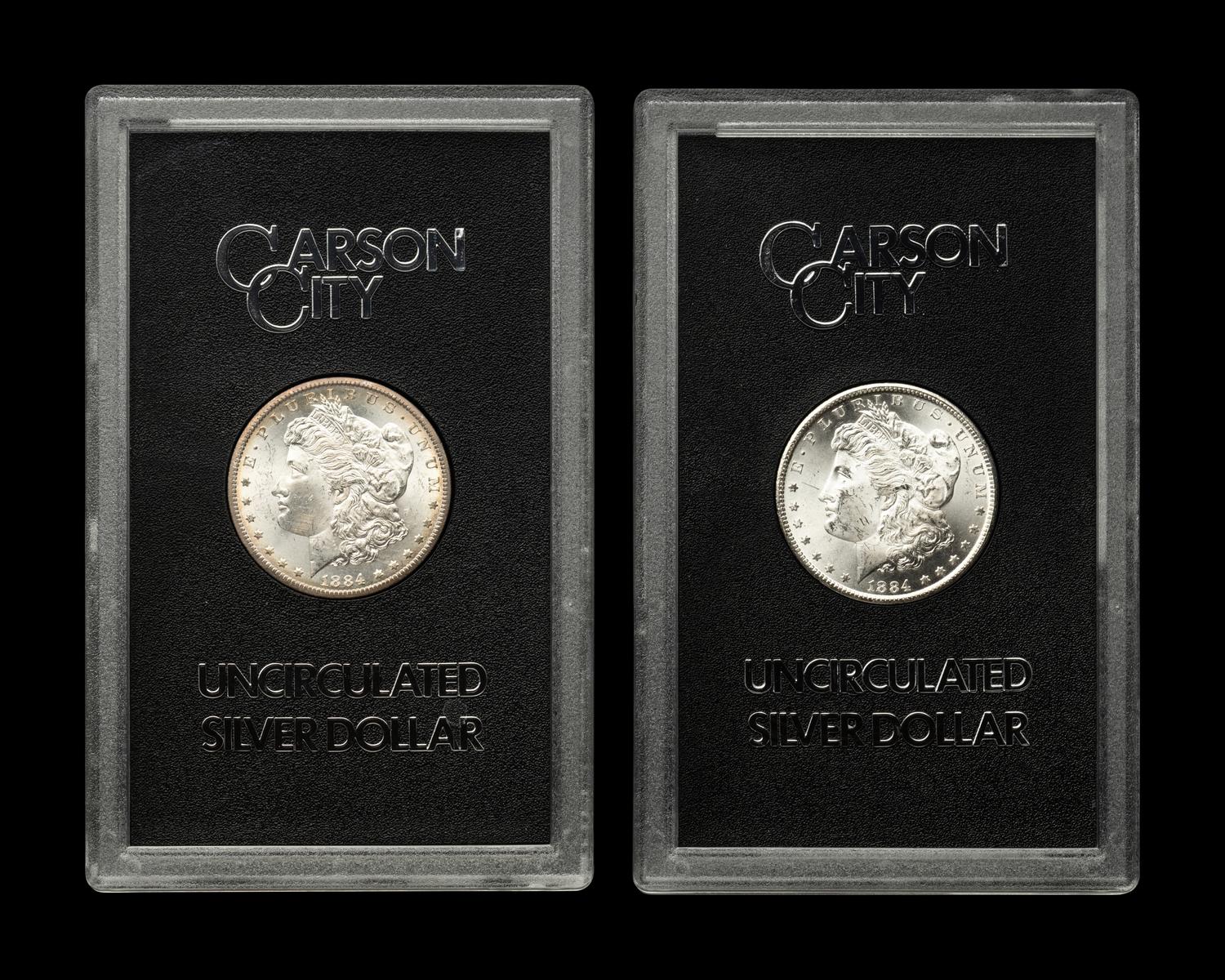 Two 1884-CC GSA: Morgan $1 Coins