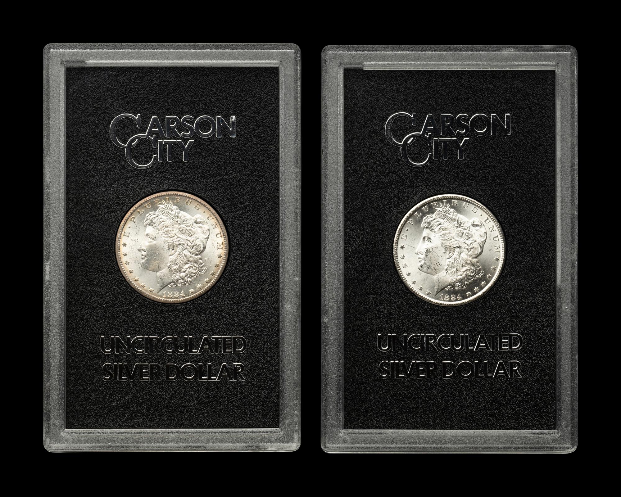 Two 1884-CC GSA: Morgan $1 Coins