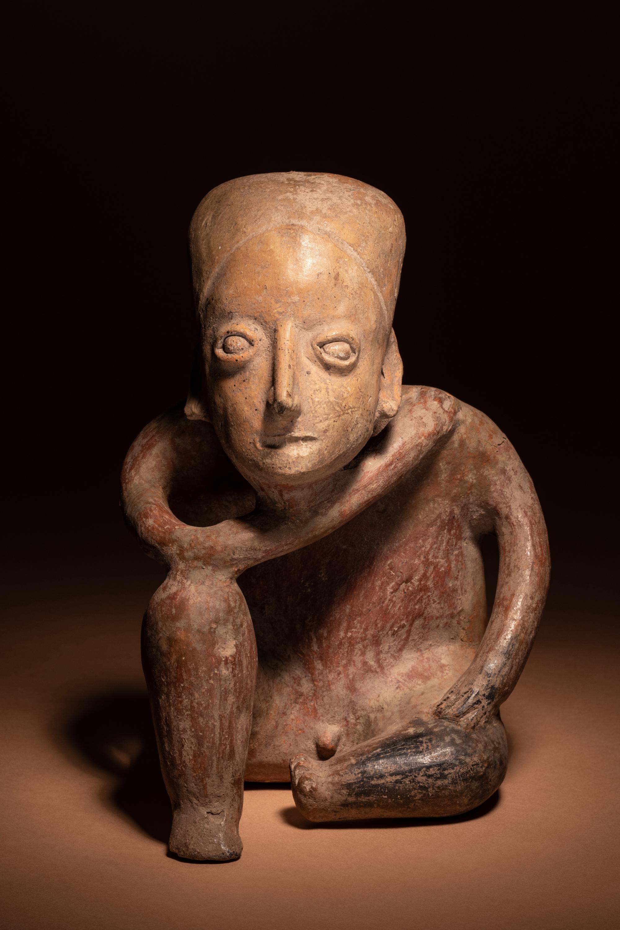 A Colima Terracotta Kneeling Figure