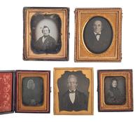 [EARLY PHOTOGRAPHY]. A group of 29 daguerreotypes featuring people with eyeglasses, including: