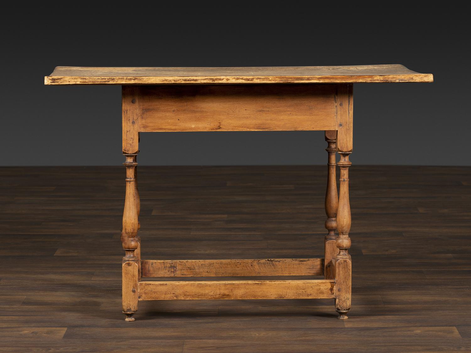 A William and Mary Pine and Maple Scrubbed Top Tavern Table