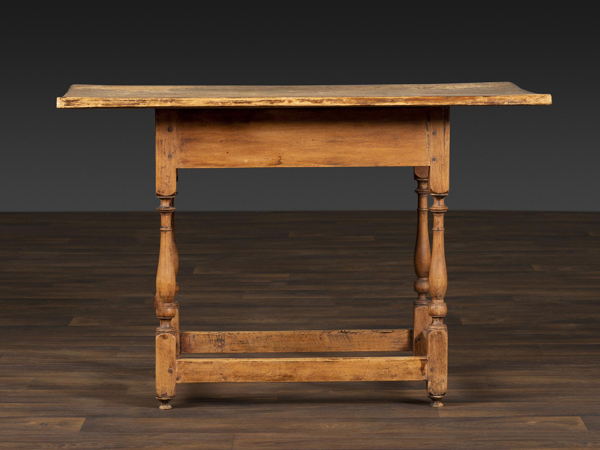A William and Mary Pine and Maple Scrubbed Top Tavern Table