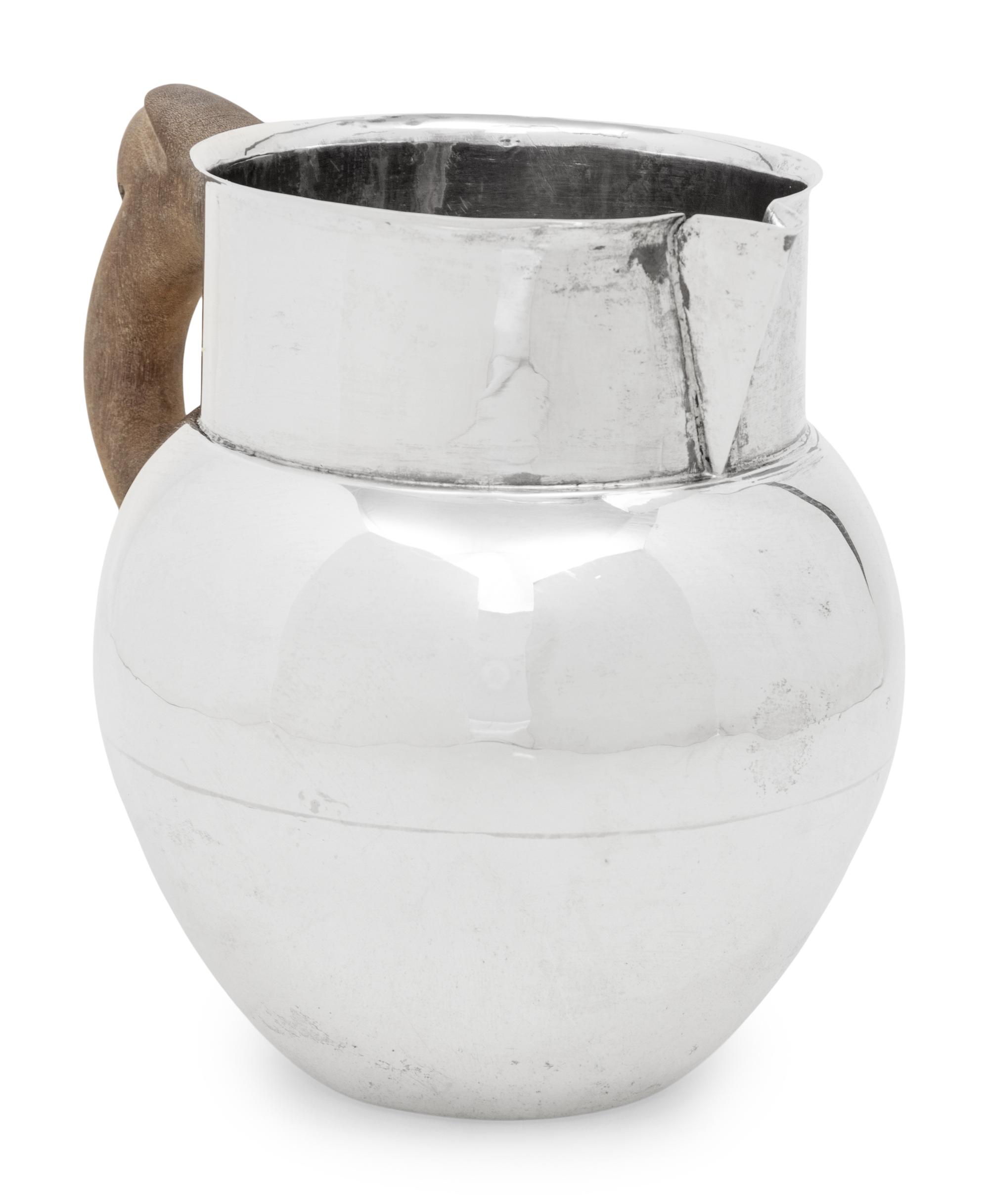 A Mexican Silver Water Pitcher