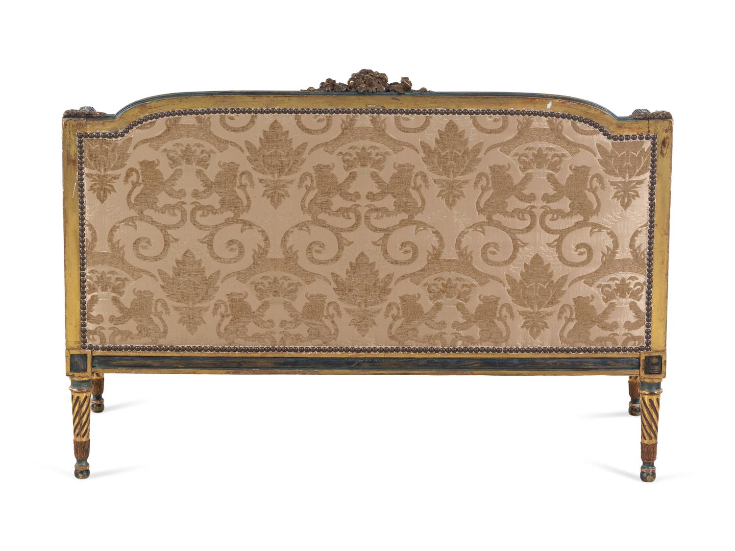 A Louis XV/XVI Transitional Style Painted and Parcel Gilt Settee