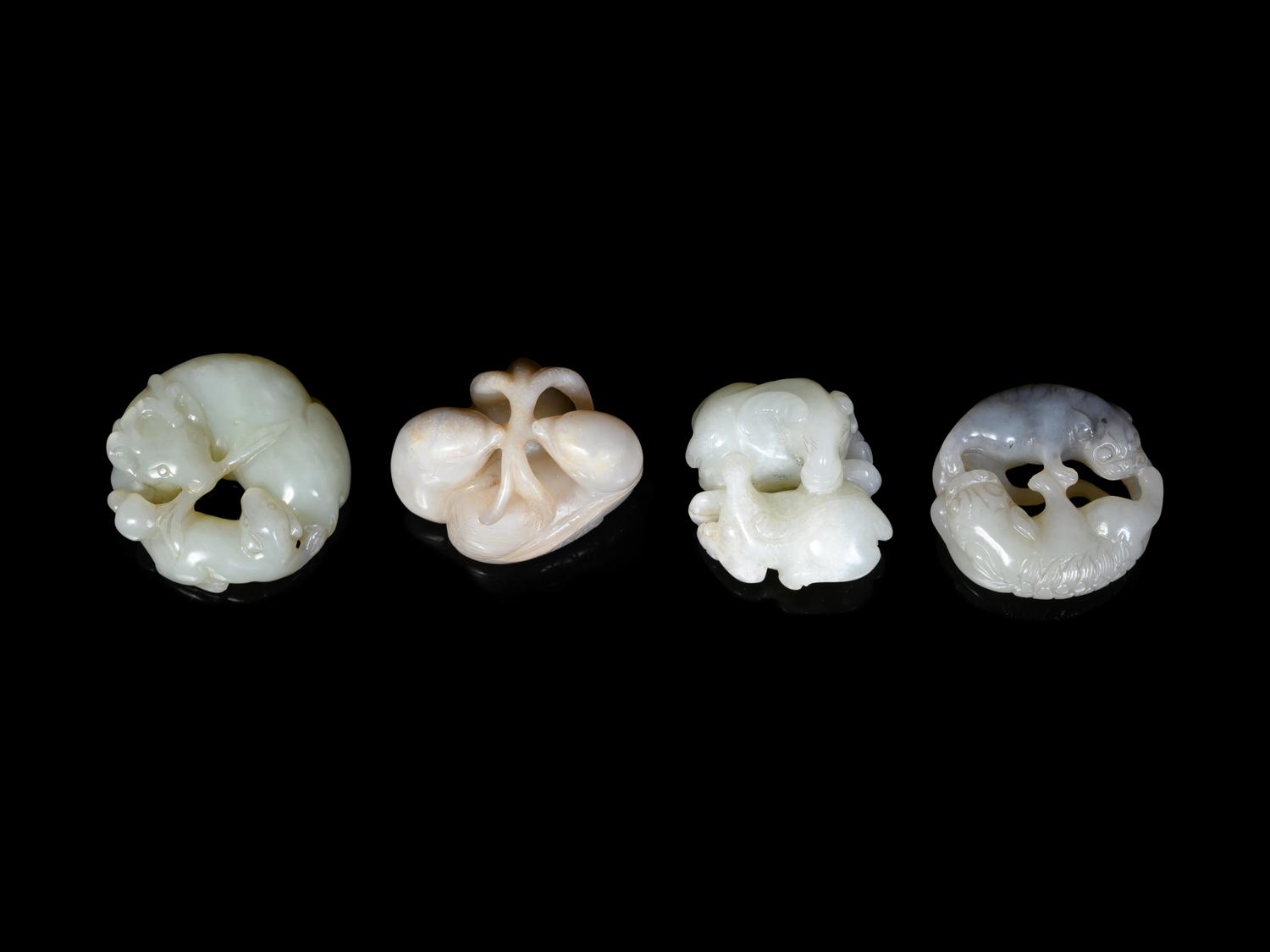 Four Chinese Celadon Jade Carvings of Double Animals
