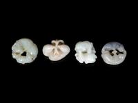 Four Chinese Celadon Jade Carvings of Double Animals