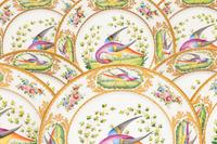 A Set of Twelve Limoges Porcelain Plates