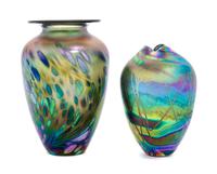 Brian Maytum, BOULDER, CO., 1985, an iridescent glass vase, accompanied by another studio made glass vase