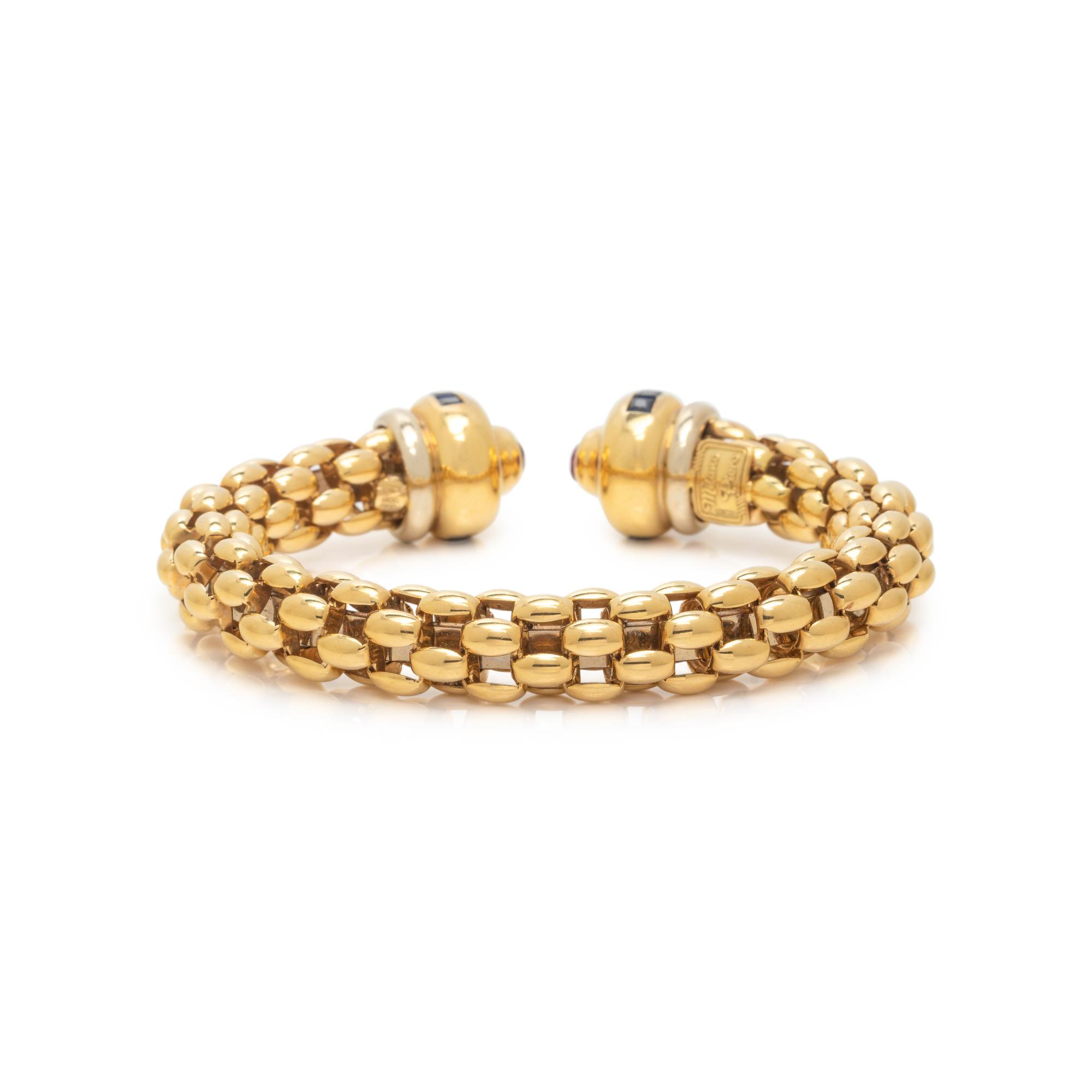 YELLOW GOLD, SAPPHIRE AND RUBY CUFF BRACELET