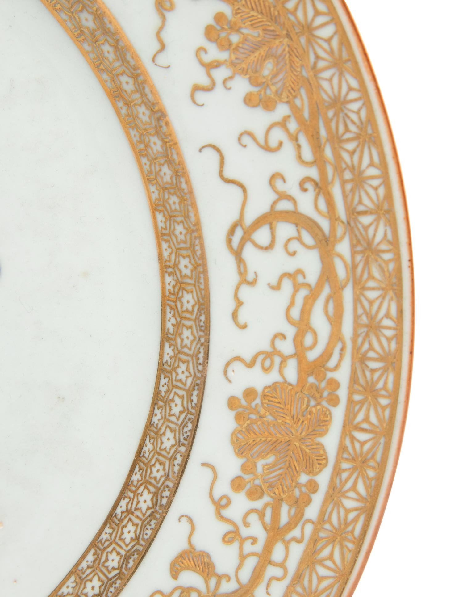 A Chinese Export Porcelain Parcel-Gilt Armorial Plate