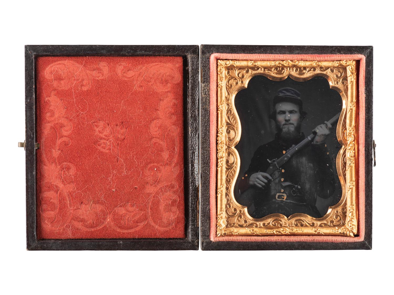 [CIVIL WAR]. Ninth plate ruby ambrotype of a doubled-armed Confederate officer from the "dead letter" file tentatively identified as Isaac A. Ing, 31st Tennessee Infantry. Richmond, Virginia: n.p., [1860s].