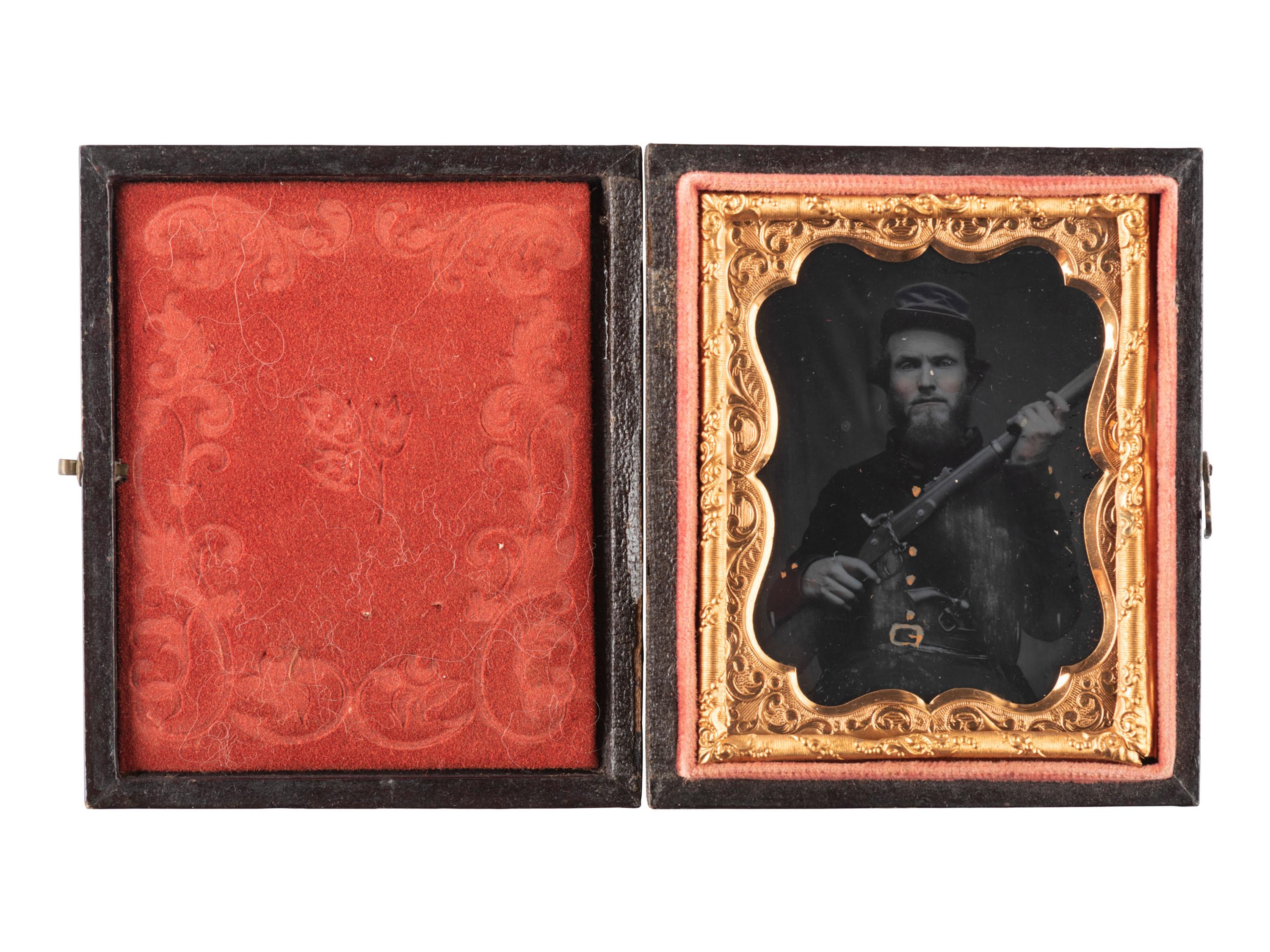 [CIVIL WAR]. Ninth plate ruby ambrotype of a doubled-armed Confederate officer from the "dead letter" file tentatively identified as Isaac A. Ing, 31st Tennessee Infantry. Richmond, Virginia: n.p., [1860s].