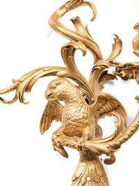 A Pair of Louis XV Style Gilt Bronze Three-Light Sconces with Parrots