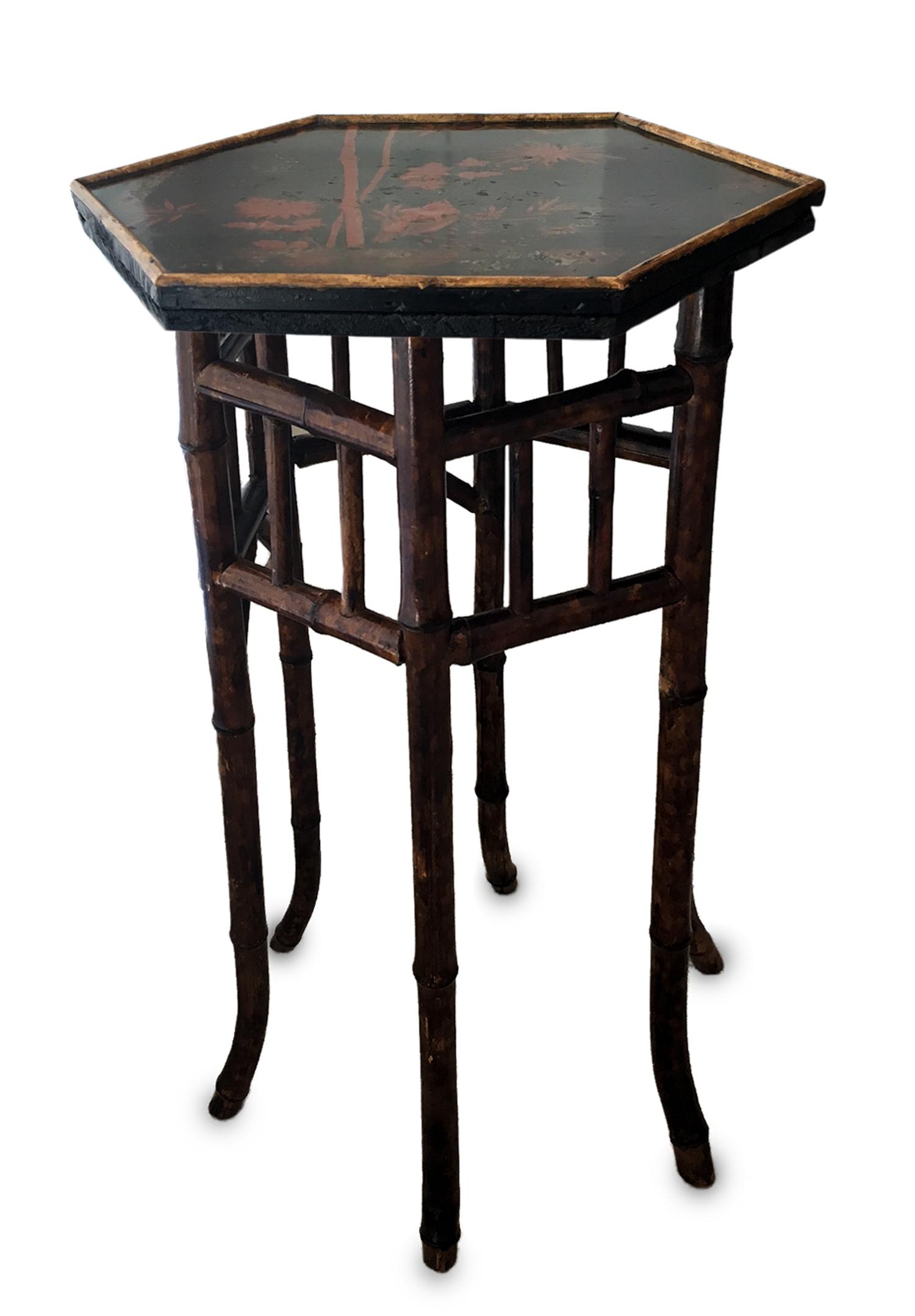 A Late Victorian Bamboo and Scarlet and Black-Lacquered Occasional Table Height 29 1/2 x width 15 inches. — LATE 19TH CENTURY