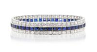 An Art Deco Platinum, Diamond and Synthetic Sapphire Bracelet, 23.10 dwts.