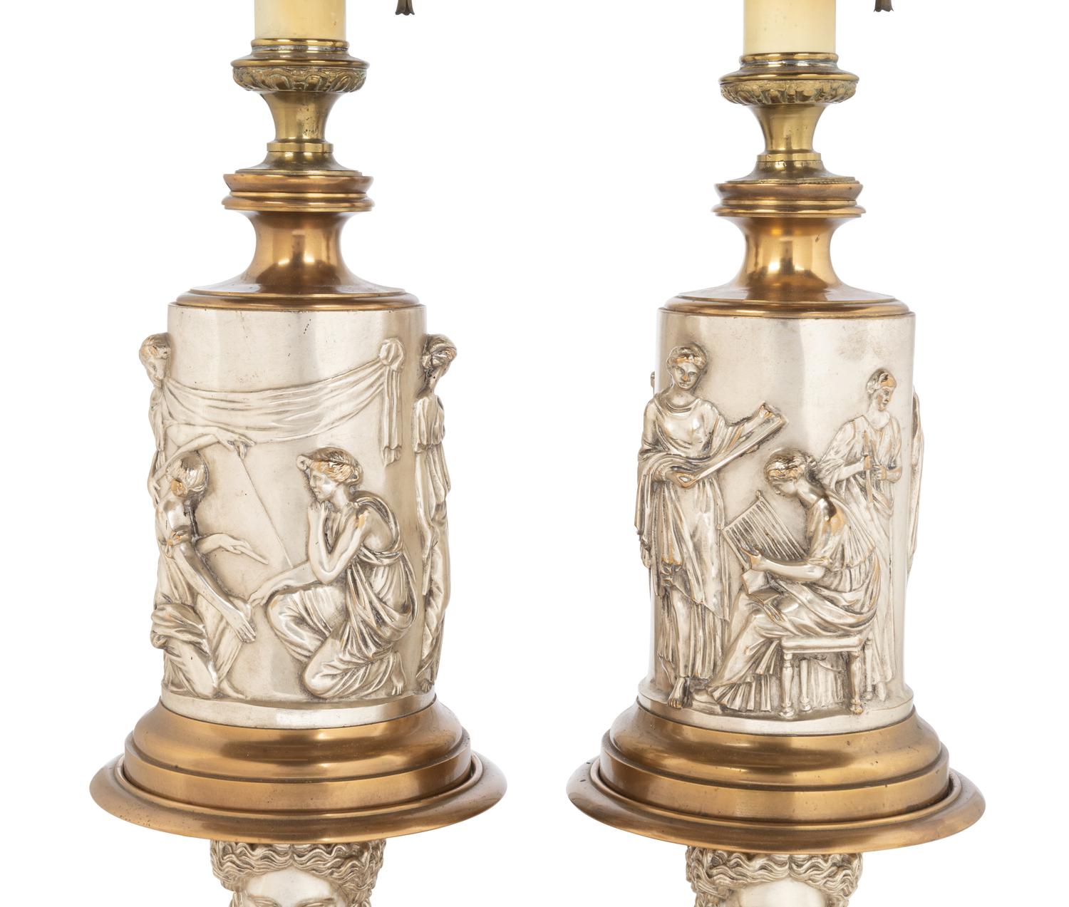 A Pair of Continental Gilt and Silvered Bronze Lamps