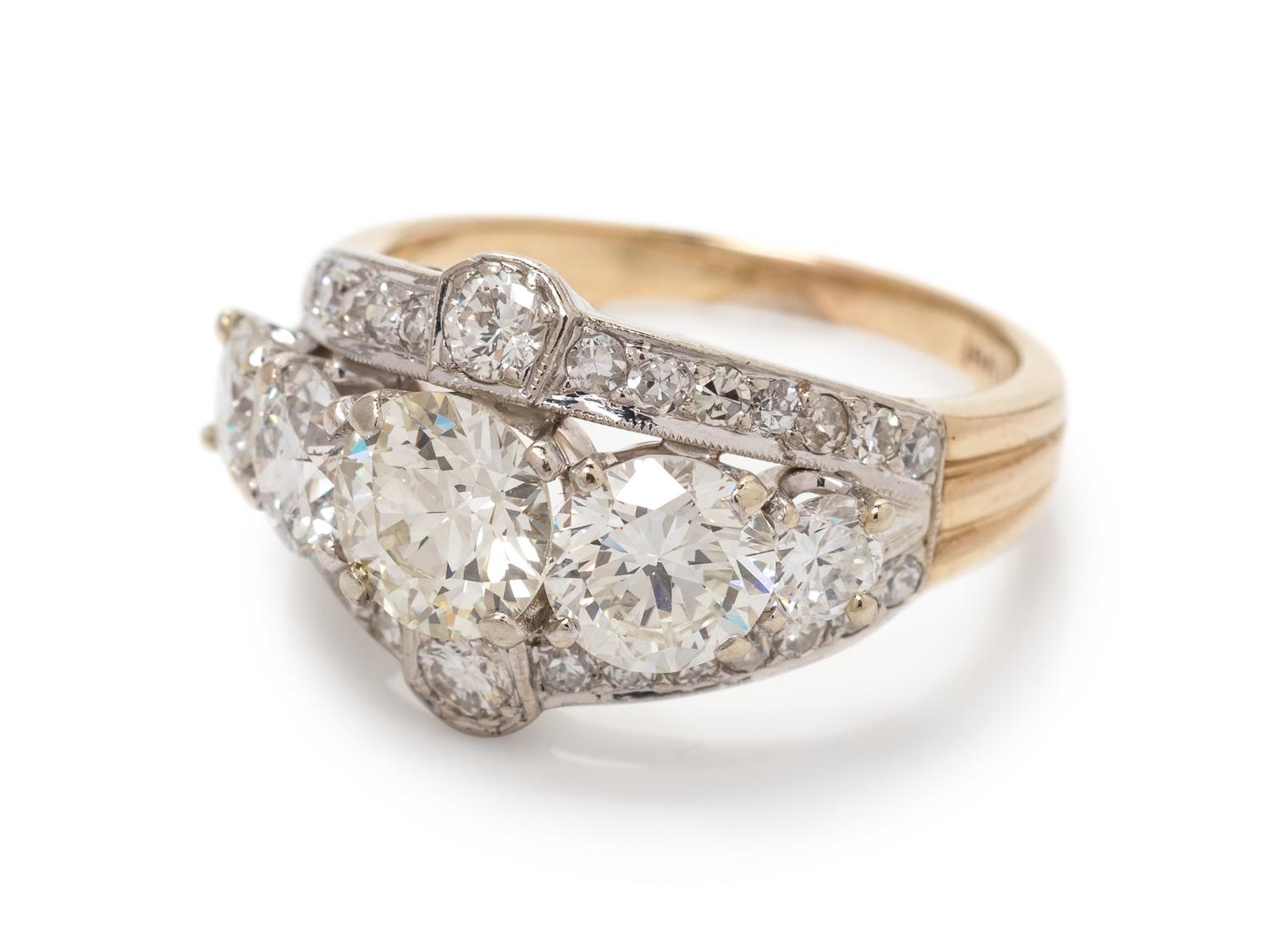 A 14 Karat Bicolor Gold and Diamond Ring,
