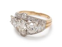 A 14 Karat Bicolor Gold and Diamond Ring,
