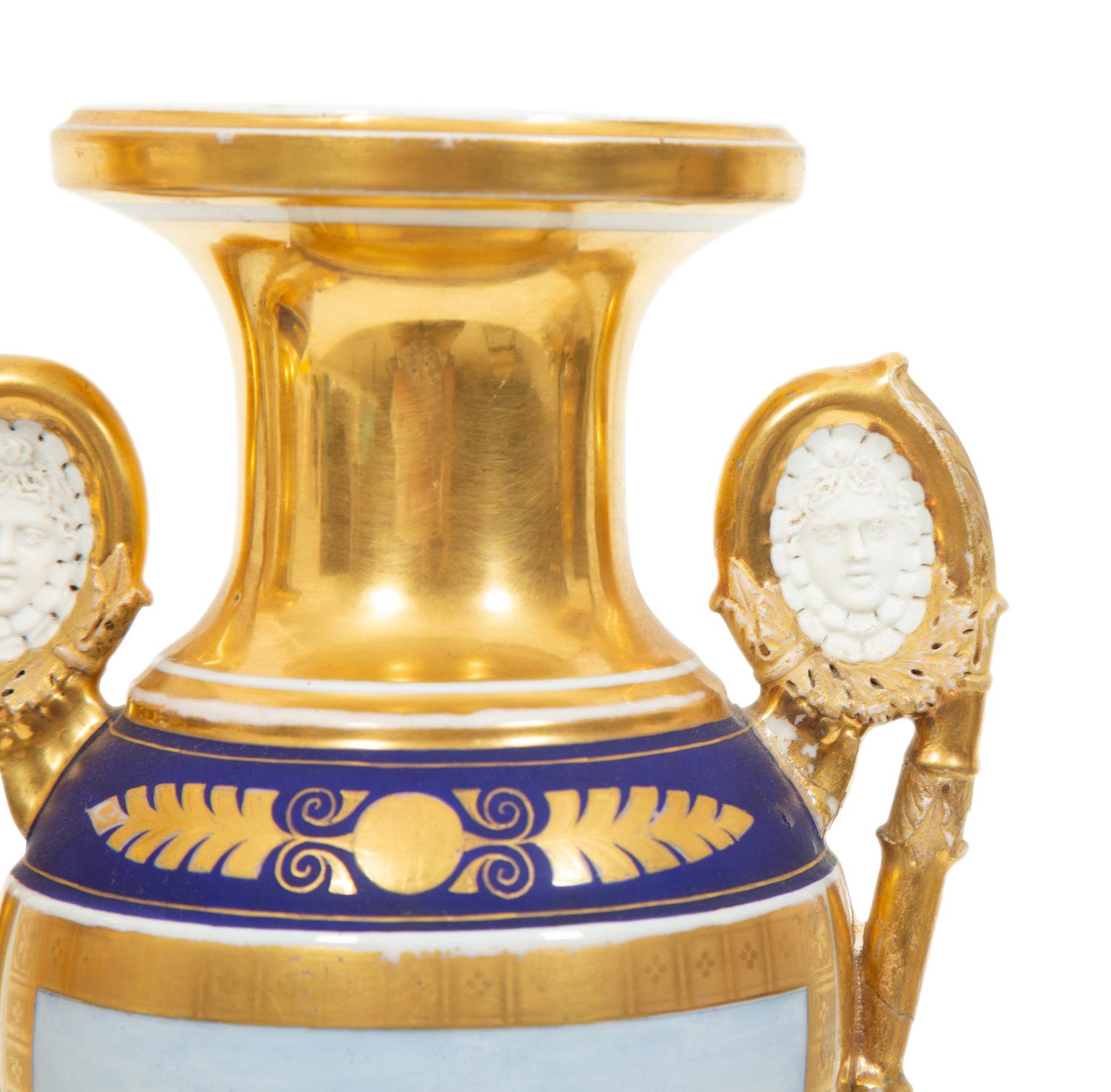 A Pair of Paris Porcelain Urns with Bisque Portrait Medallions