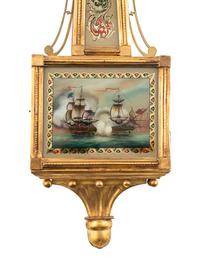 An Federal Parcel-Gilt and Eglomise Decorated Banjo Clock