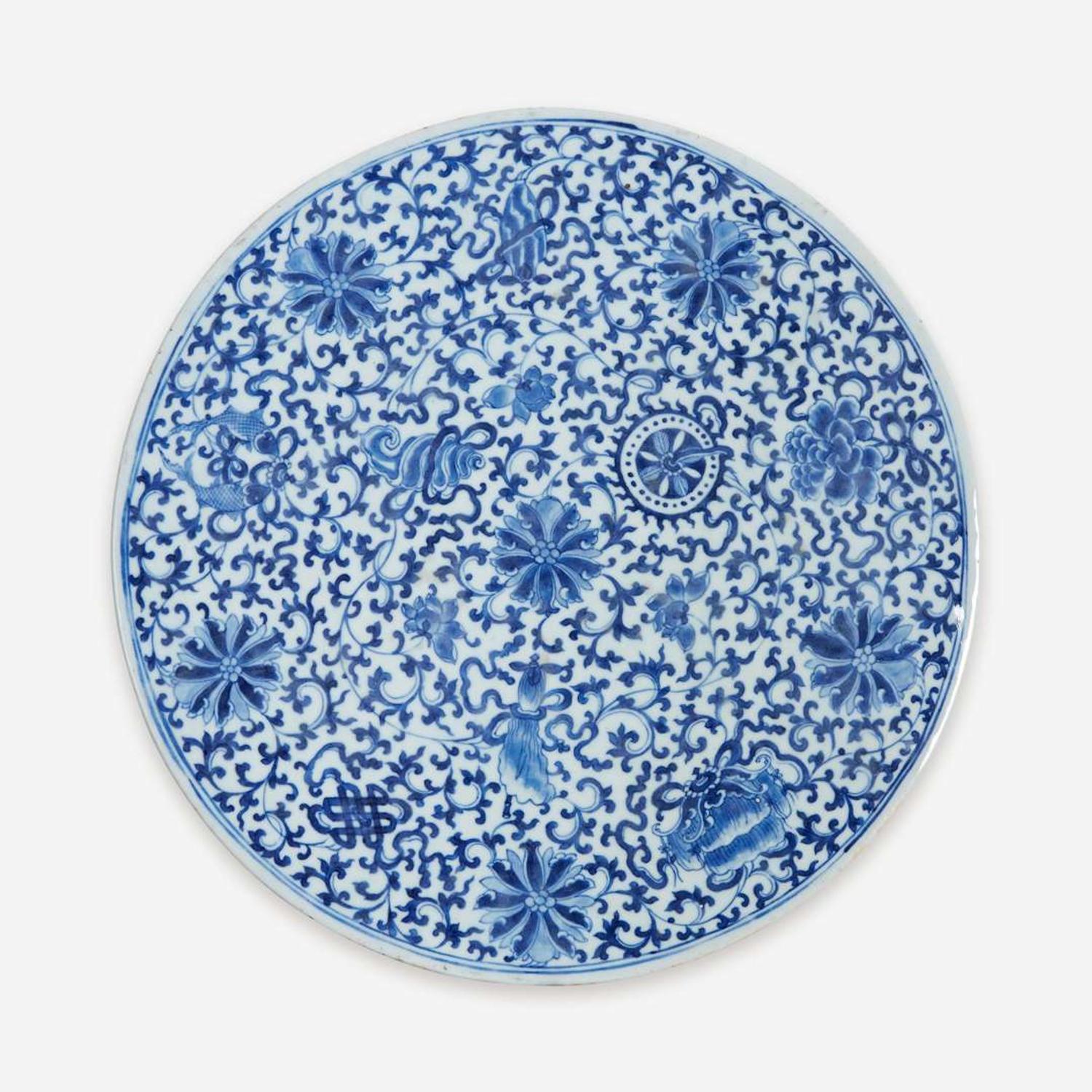 A Chinese blue and white porcelain circular plaque 青花缠枝花卉瓷板