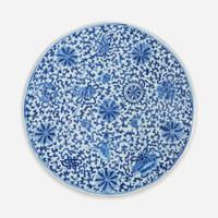 A Chinese blue and white porcelain circular plaque 青花缠枝花卉瓷板