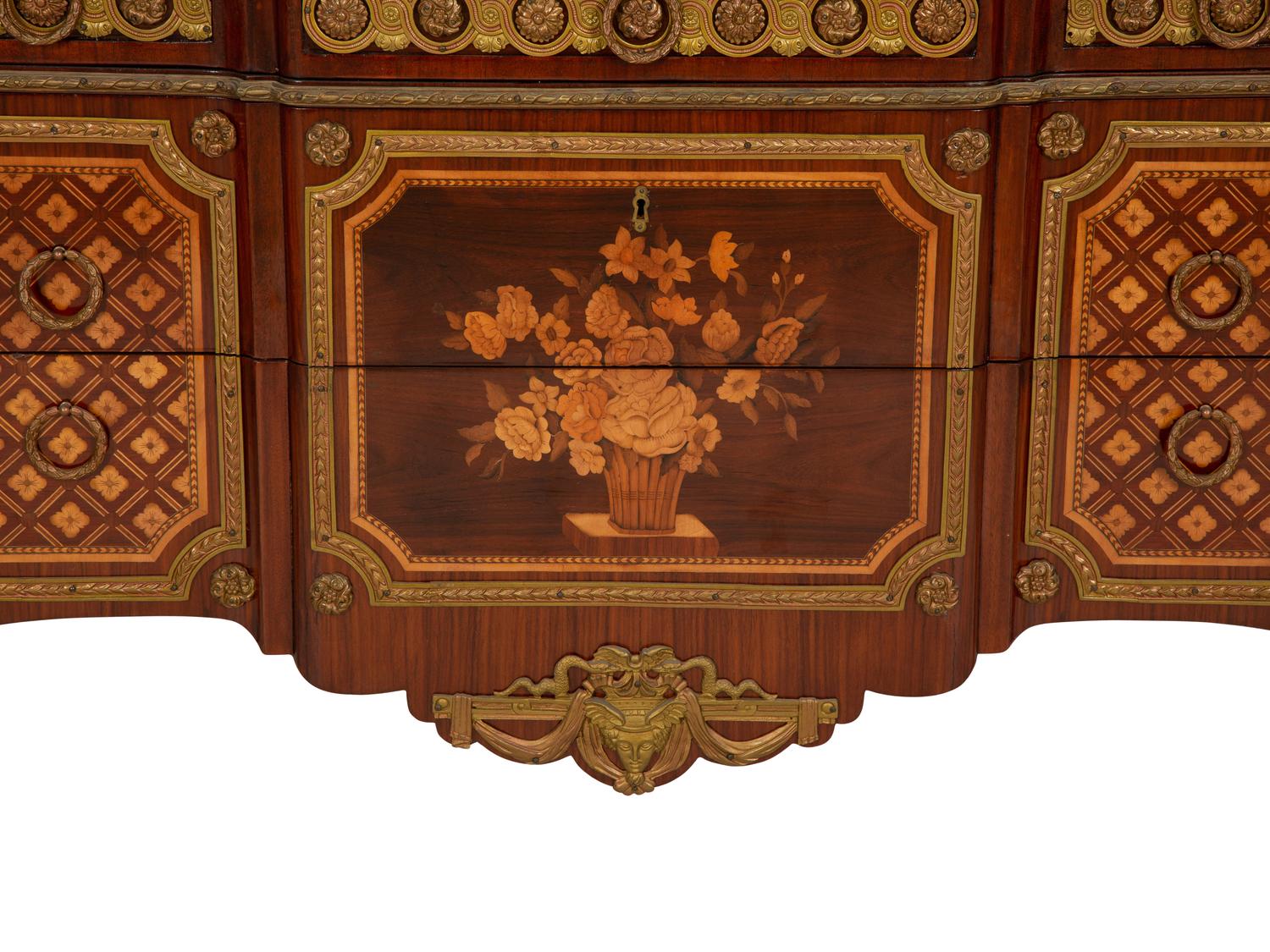 A Louis XV/XVI Transitional Style Gilt Metal Mounted Marquetry Marble-Top Commode