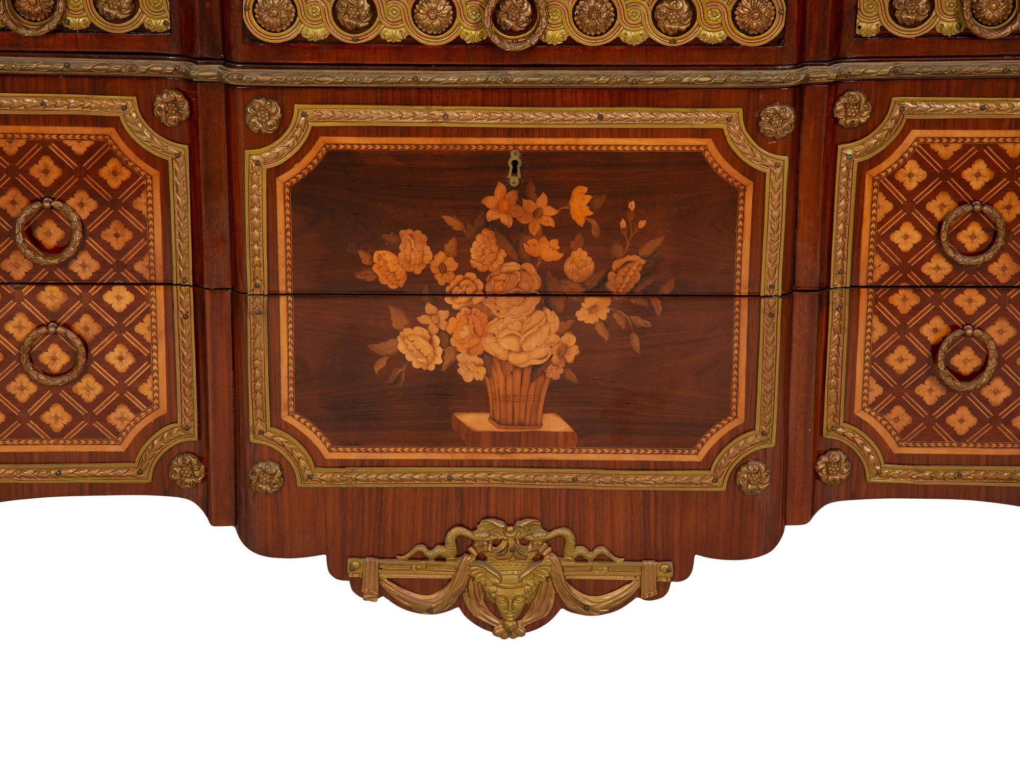 A Louis XV/XVI Transitional Style Gilt Metal Mounted Marquetry Marble-Top Commode