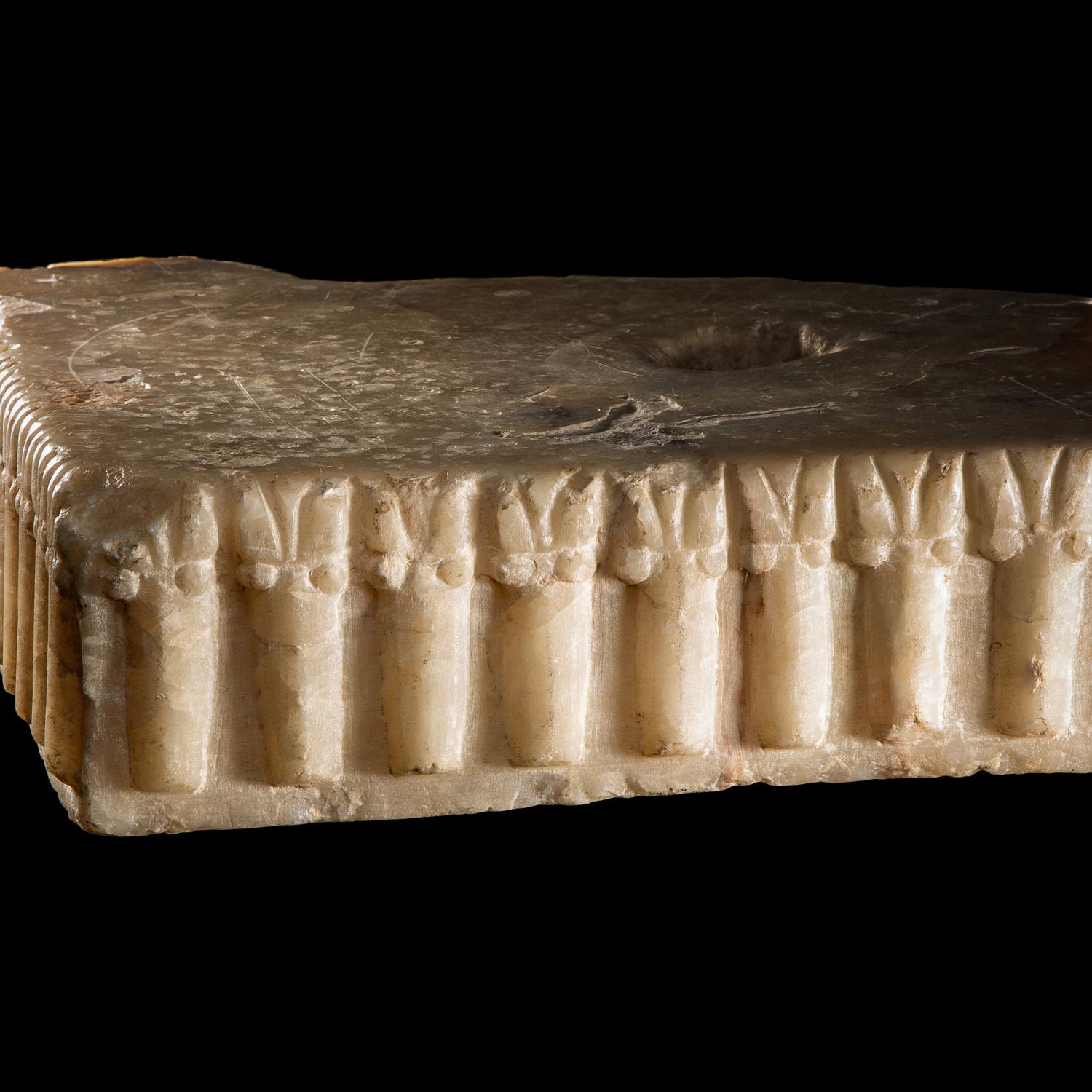 A South Arabian Fragmentary Albaster Ibex Base