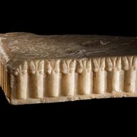 A South Arabian Fragmentary Albaster Ibex Base