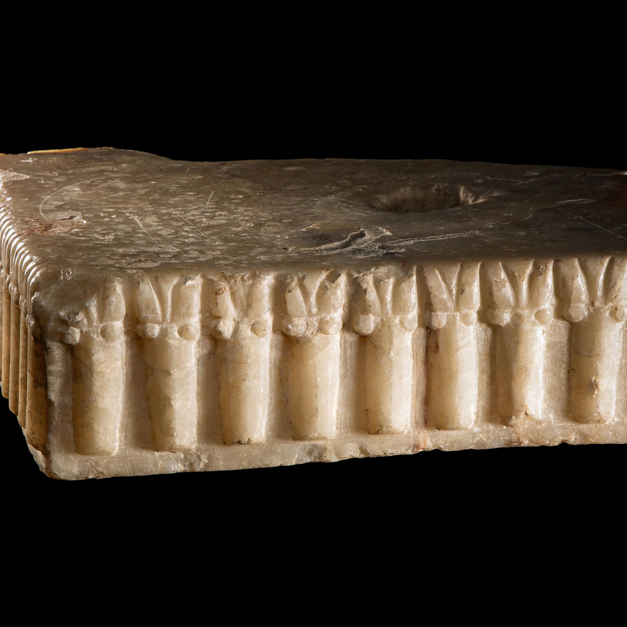A South Arabian Fragmentary Albaster Ibex Base