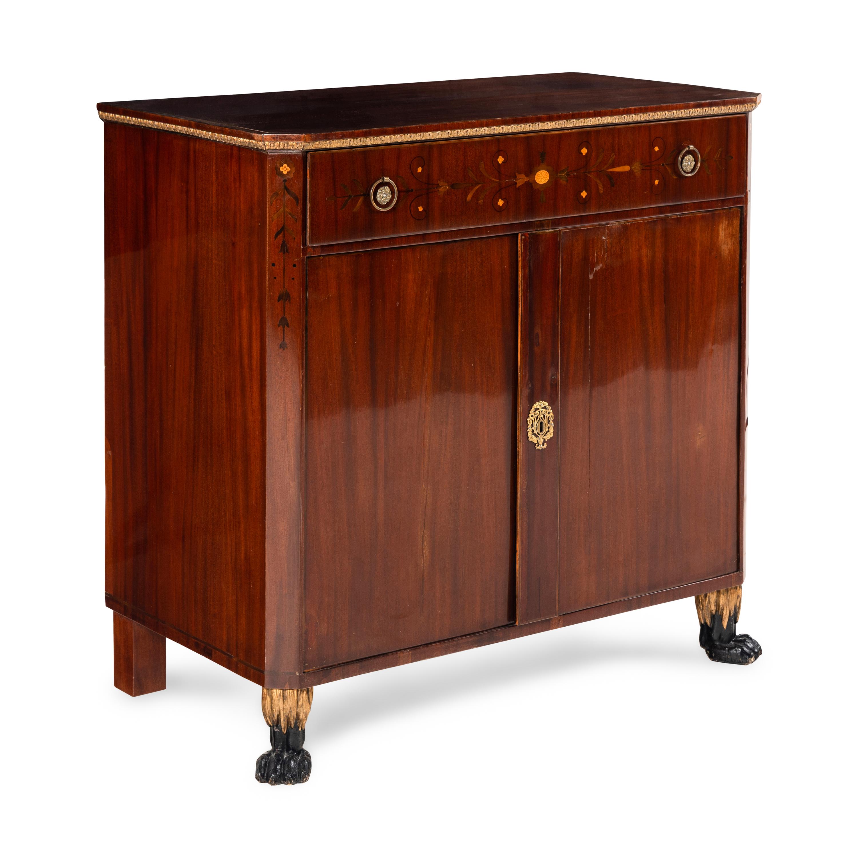 A North European Parcel Gilt Mahogany and Marquetry Dressing Cabinet