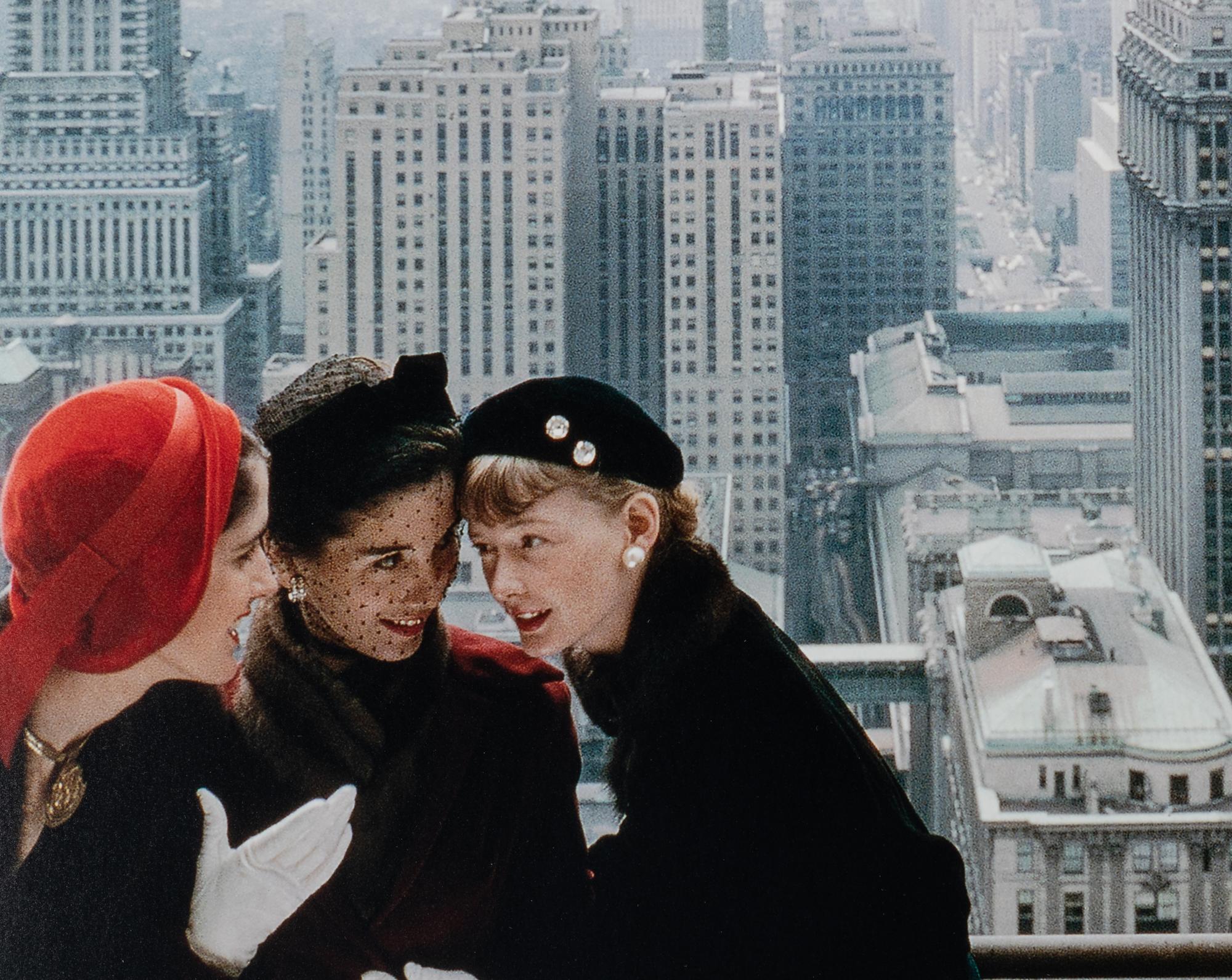 Norman Parkinson (1913-1990) Young Velvets, Young Prices, Hat Fashions, for British "Vogue" (The New York skyline from the roof of the Condé Nast building on Lexington Avenue, New York City), 1949
