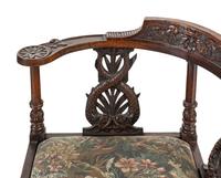 A Renaissance Revival Carved Oak Corner Chair