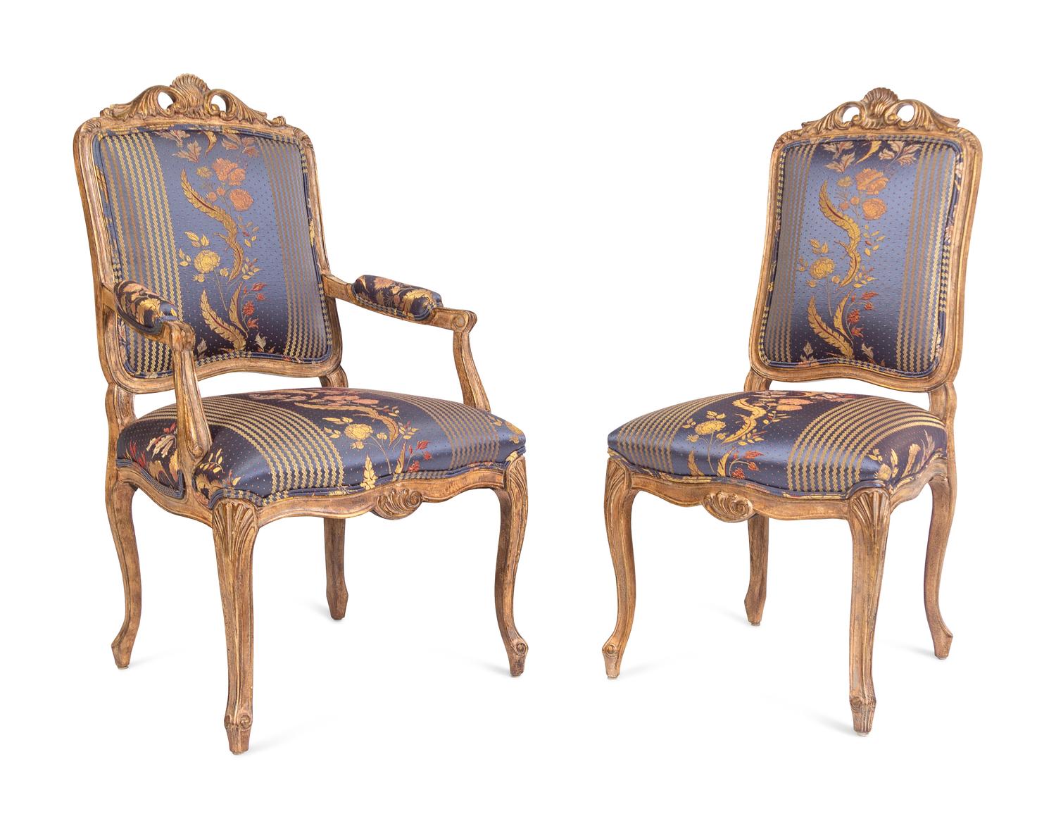 A Set of Twelve Louis XV Style Giltwood Dining Chairs