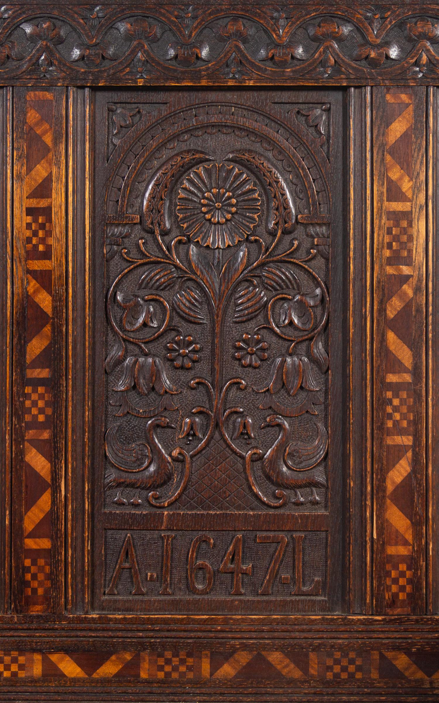 A William and Mary Style Carved Oak and Marquetry Settle