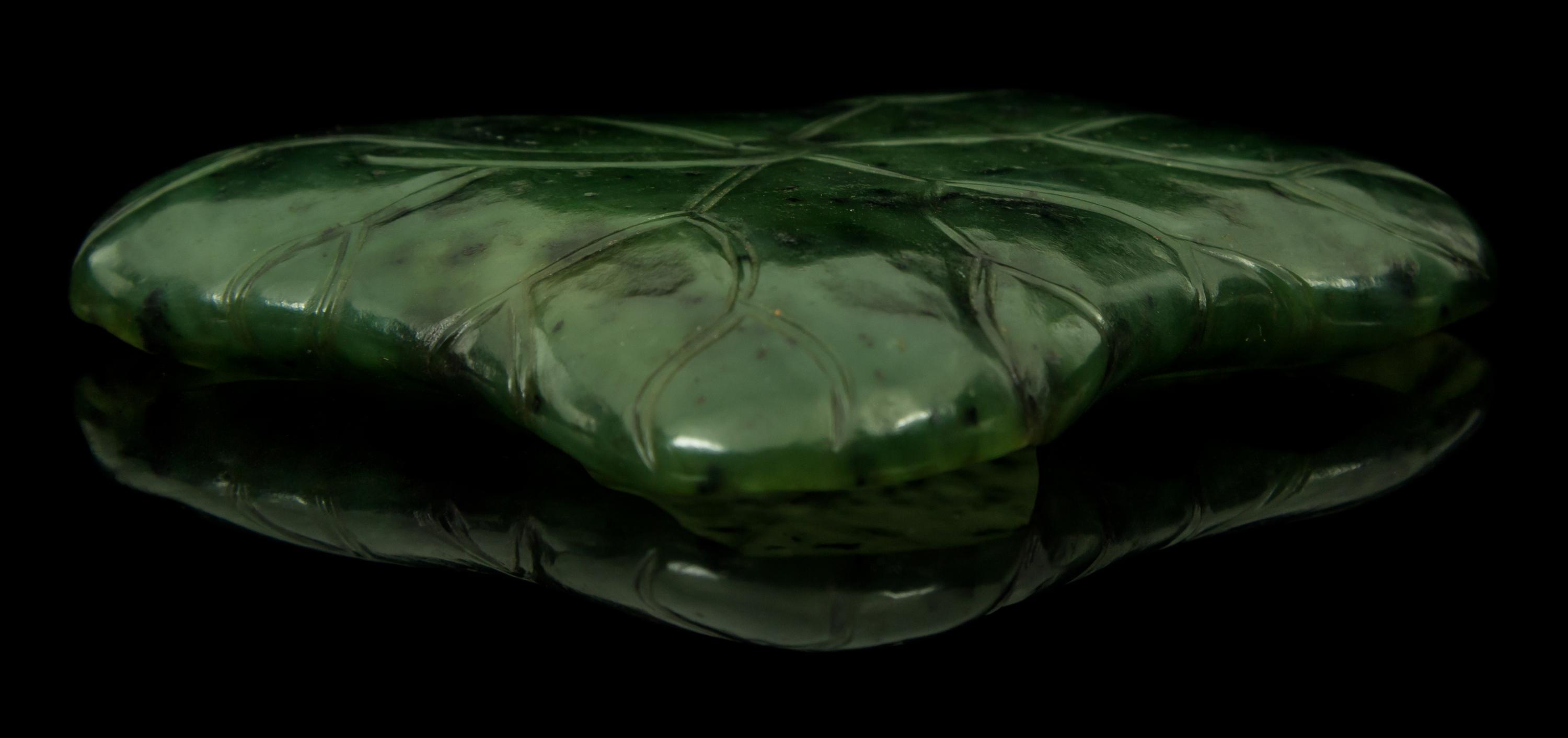 A Spinach Jade Brush Washer Width 4 1/8 inches.