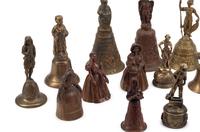 An Collection of Twenty Continental Bronze and Brass Figural Bells
