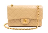 A Chanel Tan Quilted Leather Double Flap Bag, 9.5"x 5.5" x 2.5".