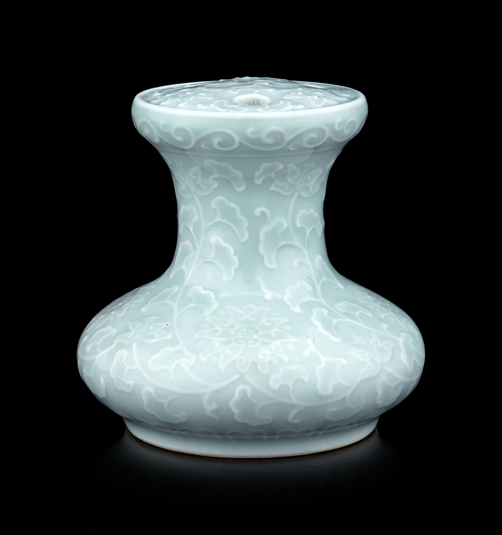 A Pale Celadon Glazed Molded Flower Pot