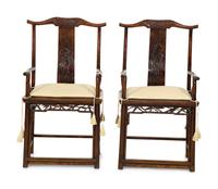A Pair of Chinese Hardwood Ming Style Yok Back Armchairs