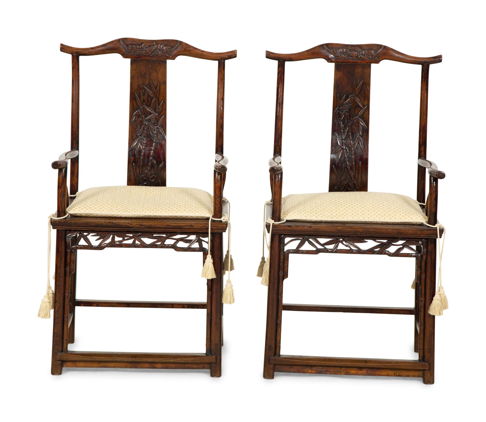 A Pair of Chinese Hardwood Ming Style Yok Back Armchairs