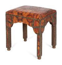 A Silvered Metal Mounted Leather Footstool