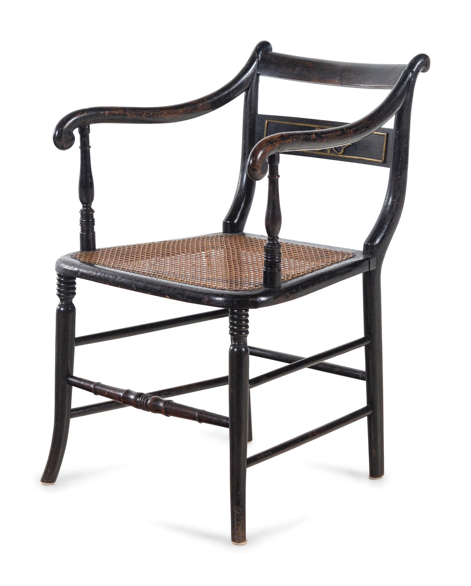 A Regency Stenciled and Ebonized Armchair