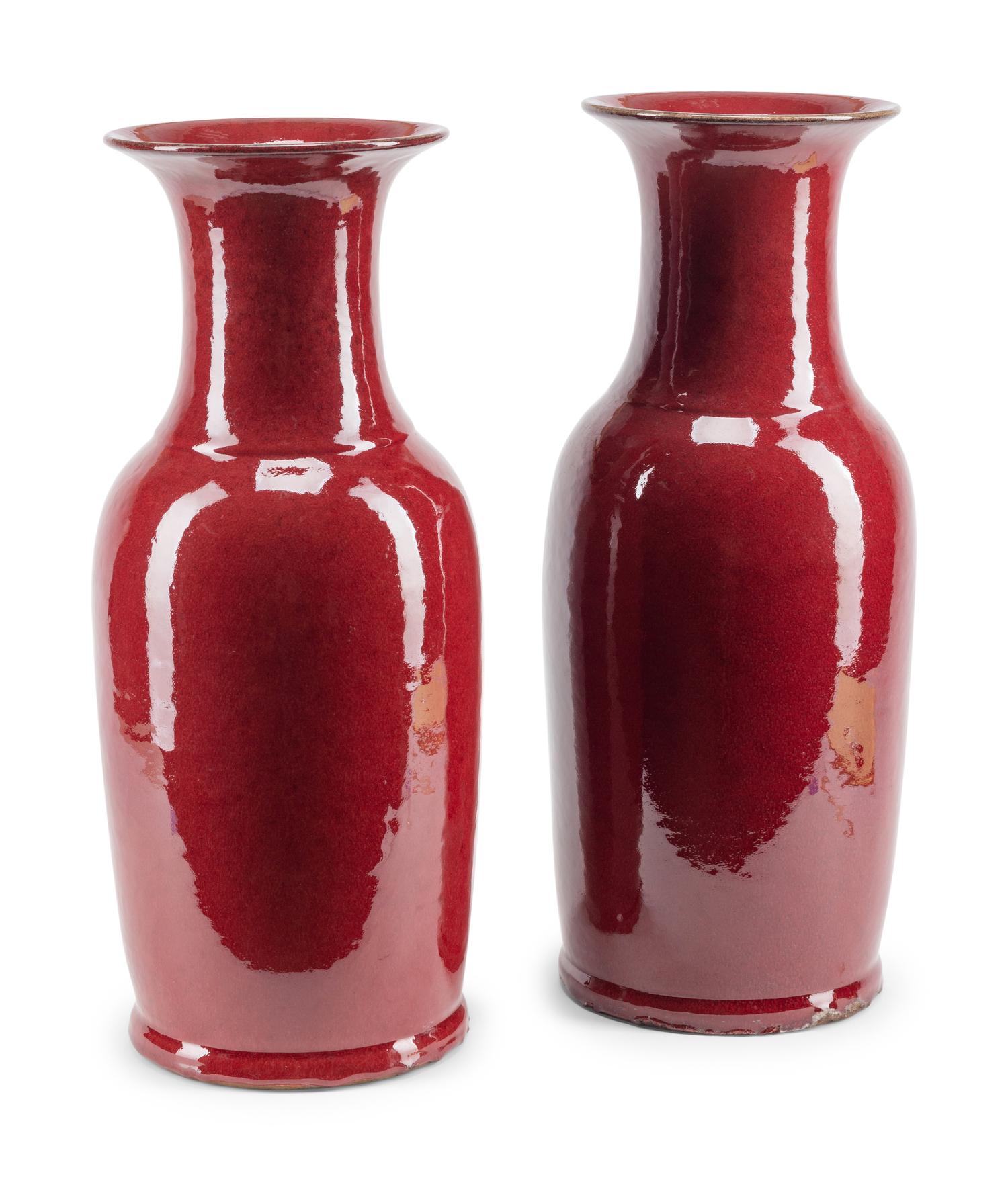 A Pair of Sang de Boeuf-Glazed Porcelain Baluster Vases