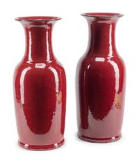 A Pair of Sang de Boeuf-Glazed Porcelain Baluster Vases
